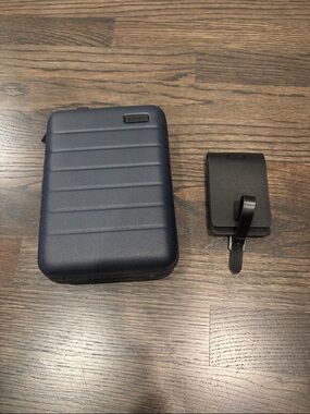Away Mini Luggage in navy with luggage tag